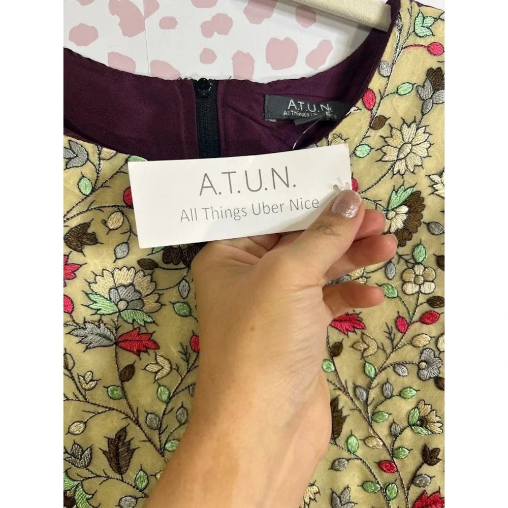 A.T.U.N. All Things Uber Nice sleeveless party